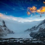 Athabasca Glacier, located in Jasper National Park in Alberta, Canada.It is one of the six primary "toes" of the Columbia Icefield, which is the largest icefield in the Canadian Rockies. The glacier is situated along the famous Icefields Parkway (Highway 93), making it one of the most accessible glaciers in North America.