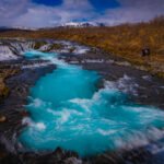 Brúarfoss, famous for its strikingly bright blue water — often called “Iceland’s Bluest Waterfall.”