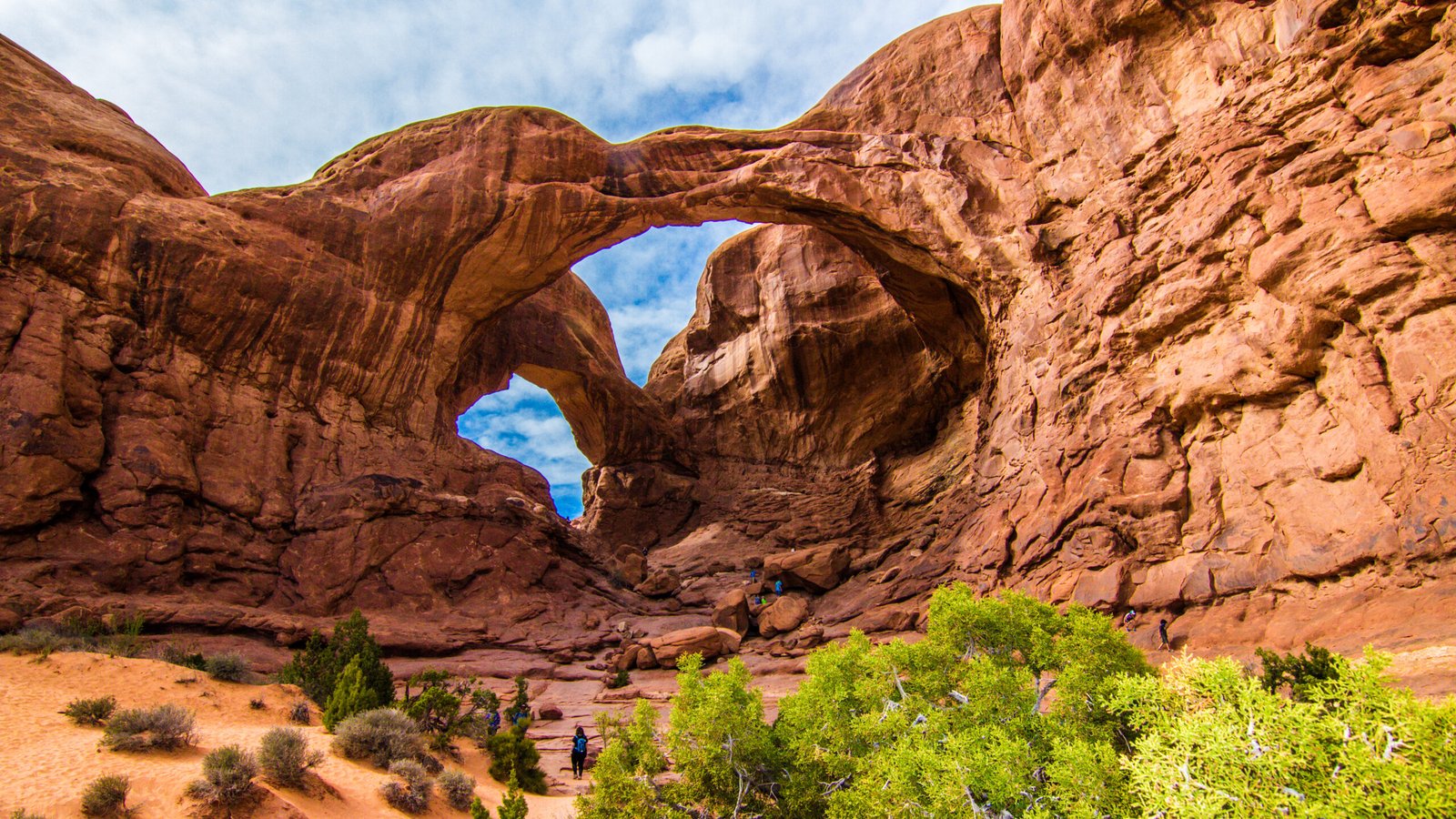 The massive, towering red sandstone arches of Double Arch