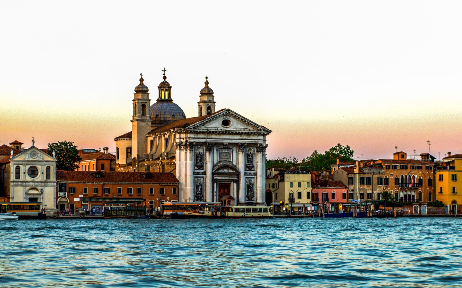 A beautiful sunset view of the grand Church of the Gesuati (Santa Maria del Rosario) situated along the Giudecca Canal in Venice, Italy