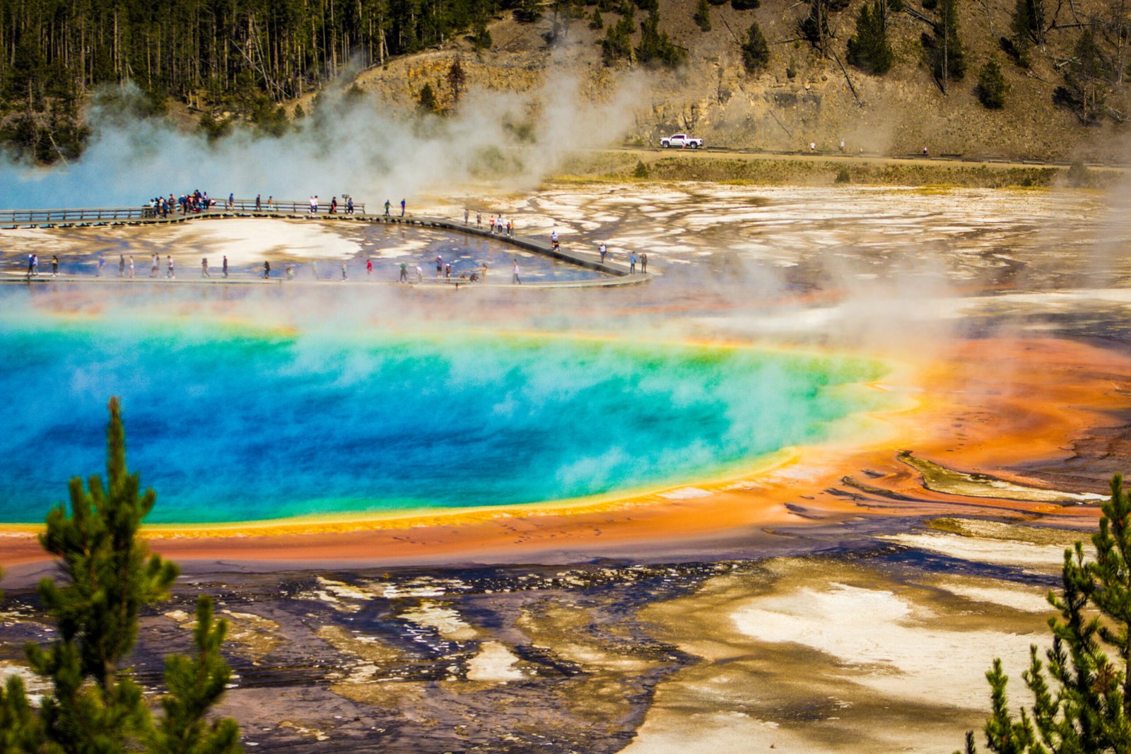 The vibrant, rainbow-colored rings of the Grand Prismatic Spring